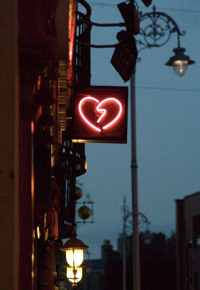 heart neon on building wall